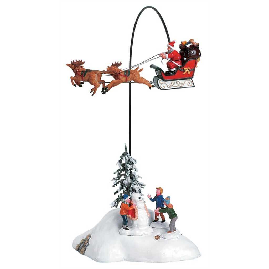 lemax-santa-claus-is-coming-to-town-figurenset-4-teilig-mit-drehfunktion image 1