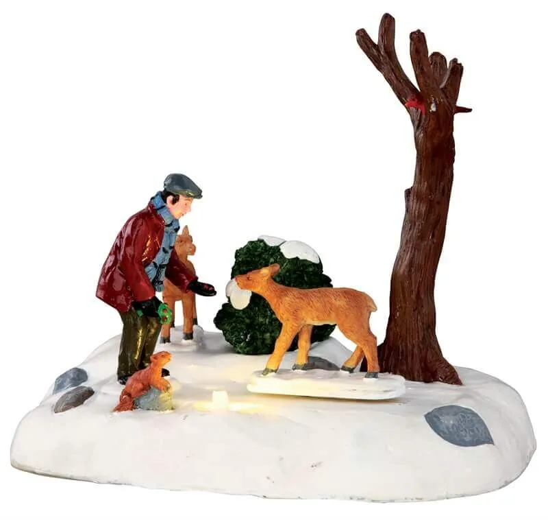 lemax-feeding-deer-animierte-miniatur-figur-mann-f-ttert-hirsch image 1