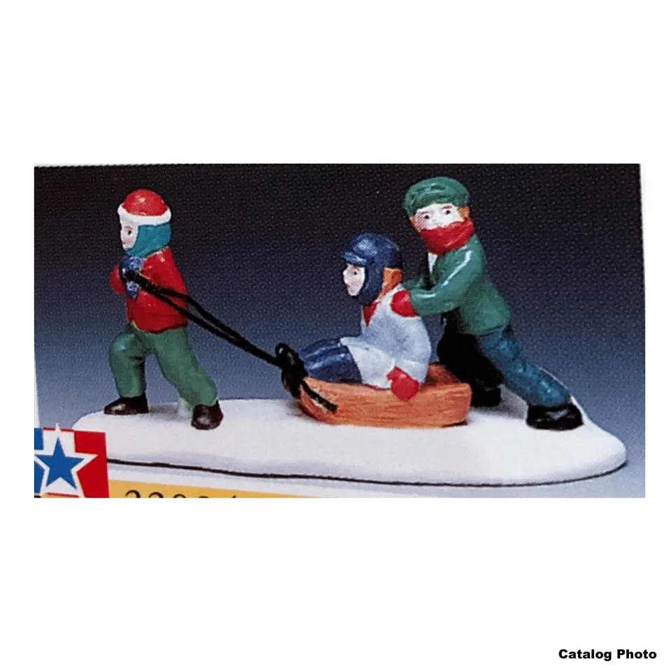 lemax-pulling-sled-weihnachts-miniaturfigur-schlitten-szene image 1
